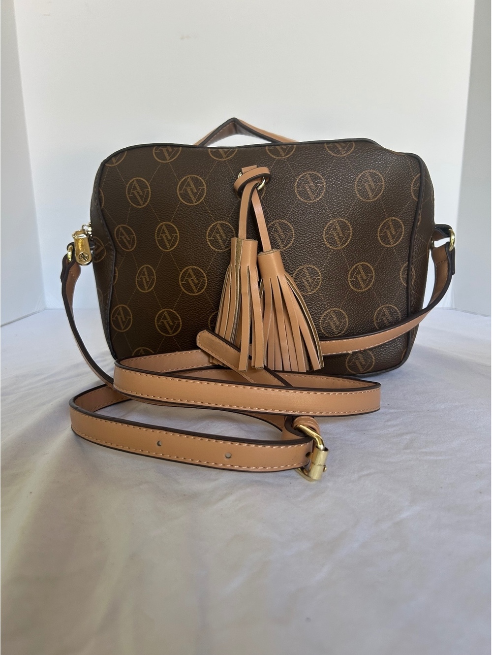 Adrienne Vittadini Brown Monogram Crossbody Bag with Tassel Detail